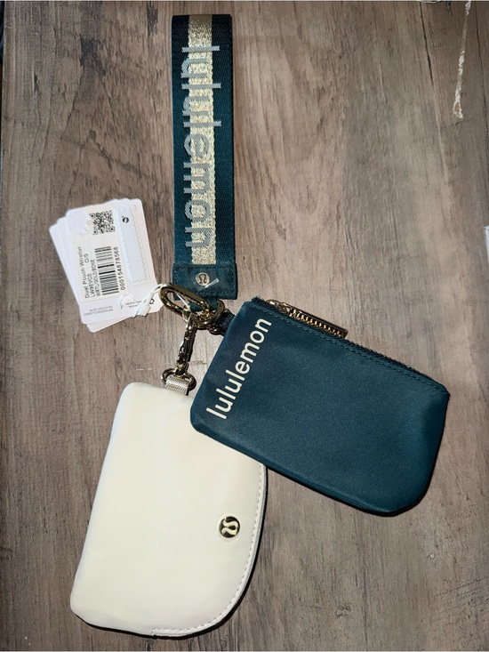 lululemon athletica Handbags - Lululemon Dual Pouch Wristlet Wordmark Warp Teal/Bone/Gold